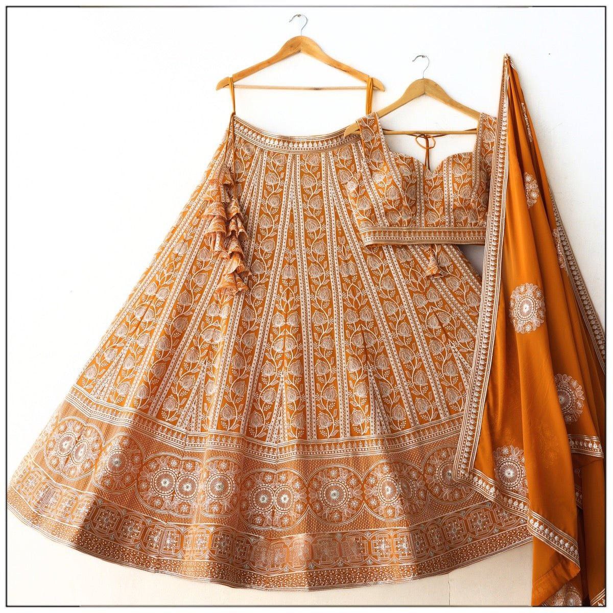 Orange Embroidered Lehenga Choli Set with Traditional White Threadwork and Matching Dupatta