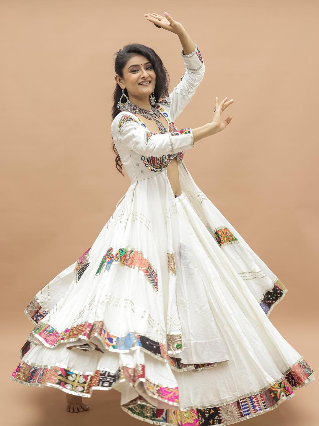 “Aarvi’s White Patchwork Mirror Navratri Choli