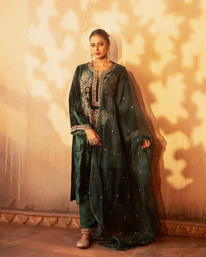 Elegant green velvet suit with golden embroidery and dupatta