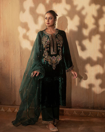 Elegant green velvet suit with golden embroidery and dupatta