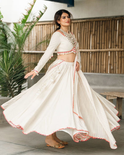 Meraki white lehenga set  with Subtle Pink Highlights
