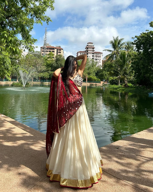 Aarohi  Grace Cream & Maroon Mirror Work Lehenga choli
