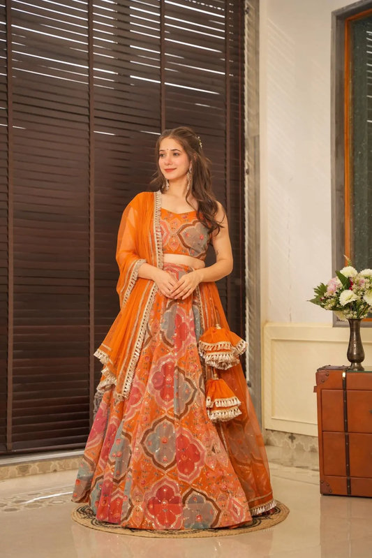 Sunset Glow Vibrant Orange Lehenga with Exquisite Floral Motifs