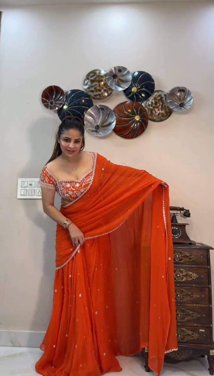 Reinventing Traditional Orange Embroidered Saree